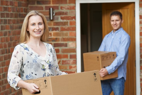 Professional local removals team handling boxes in Grovepark